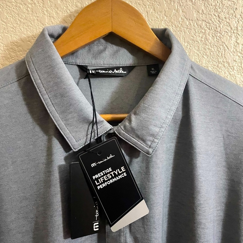 Travis Mathew Men Polo shirt Jameson Orange print logo